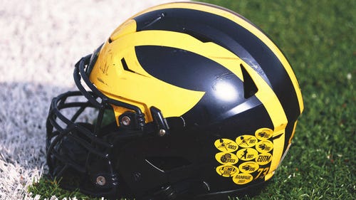 COLLEGE FOOTBALL Trending Image: NCAA proposes coach-to-player helmet communication, two-minute warning